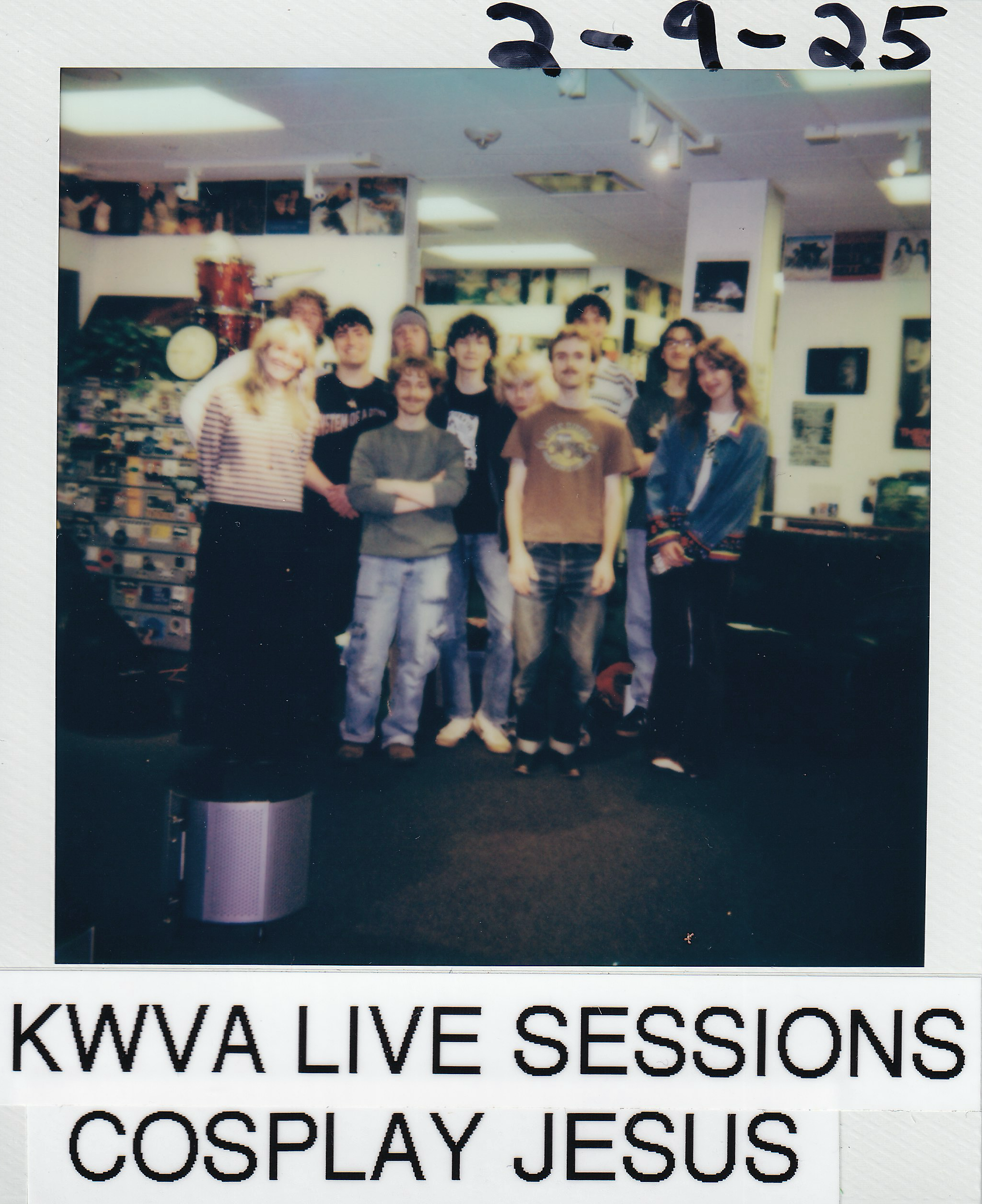 Polaroid photo reading "KWVA Live Sessions Cosplay Jesus February 9th 2025" featuring kwva staff and members of the band cosplay jesus