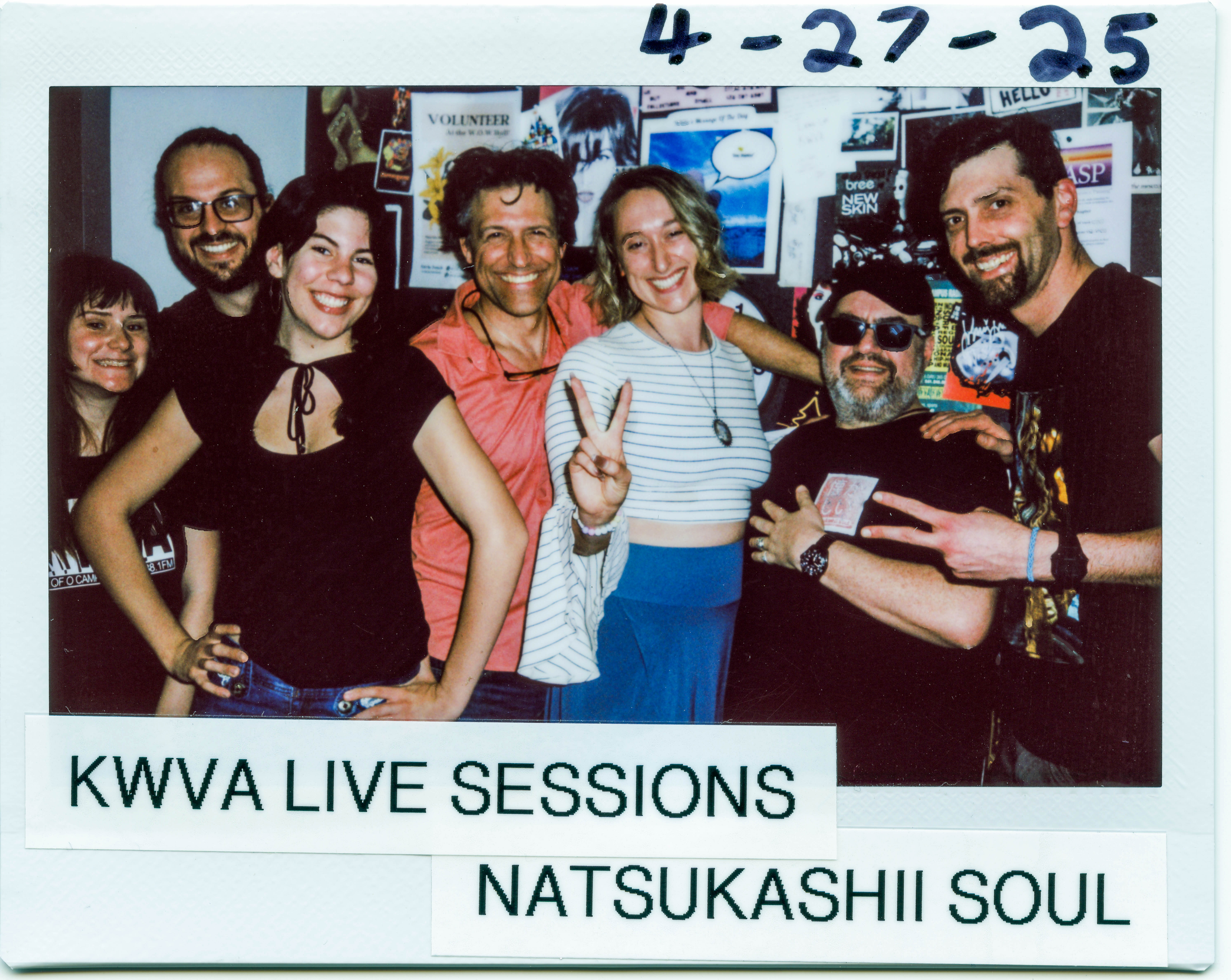Polaroid framed picture featuring KWVA staff and members of the band Natsukashii Soul posing in the KWVA studios