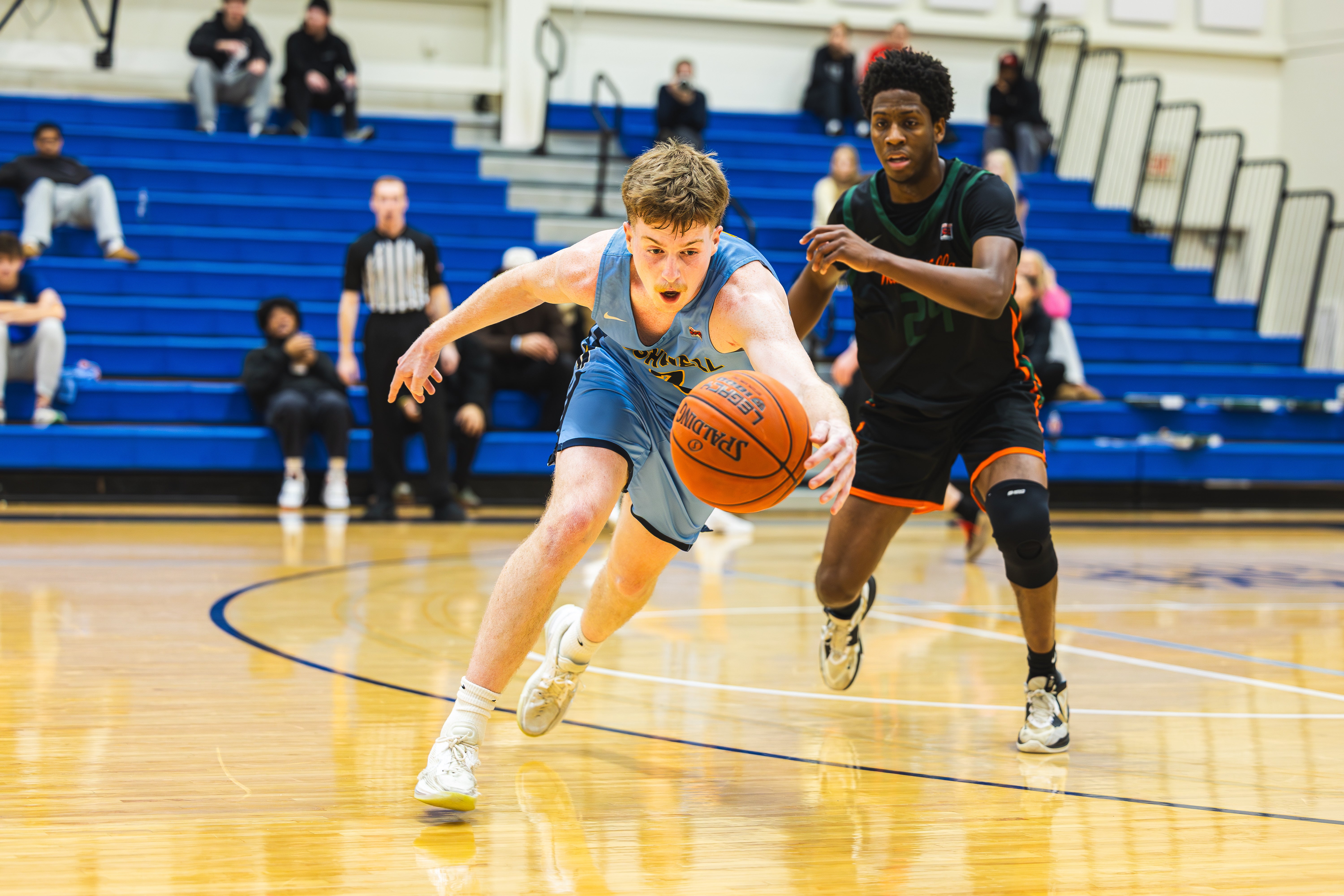 Bushnell's Kaleb Burnett dives for a loose ball during the Beacons' 83-77 win over Walla Walla