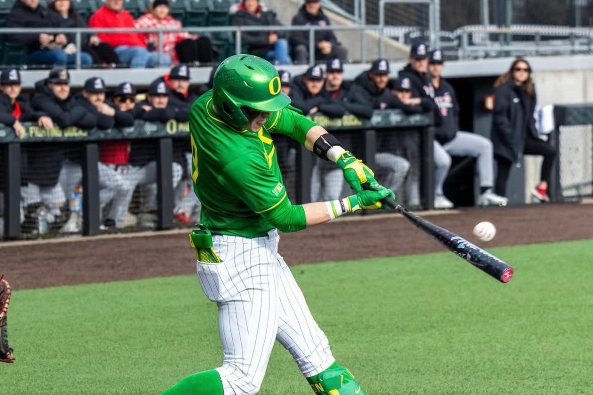 Maddox Molony sends a base hit back up the middle