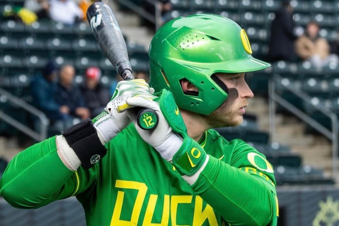 Oregon's Ryan Cooney stands at the ready on deck