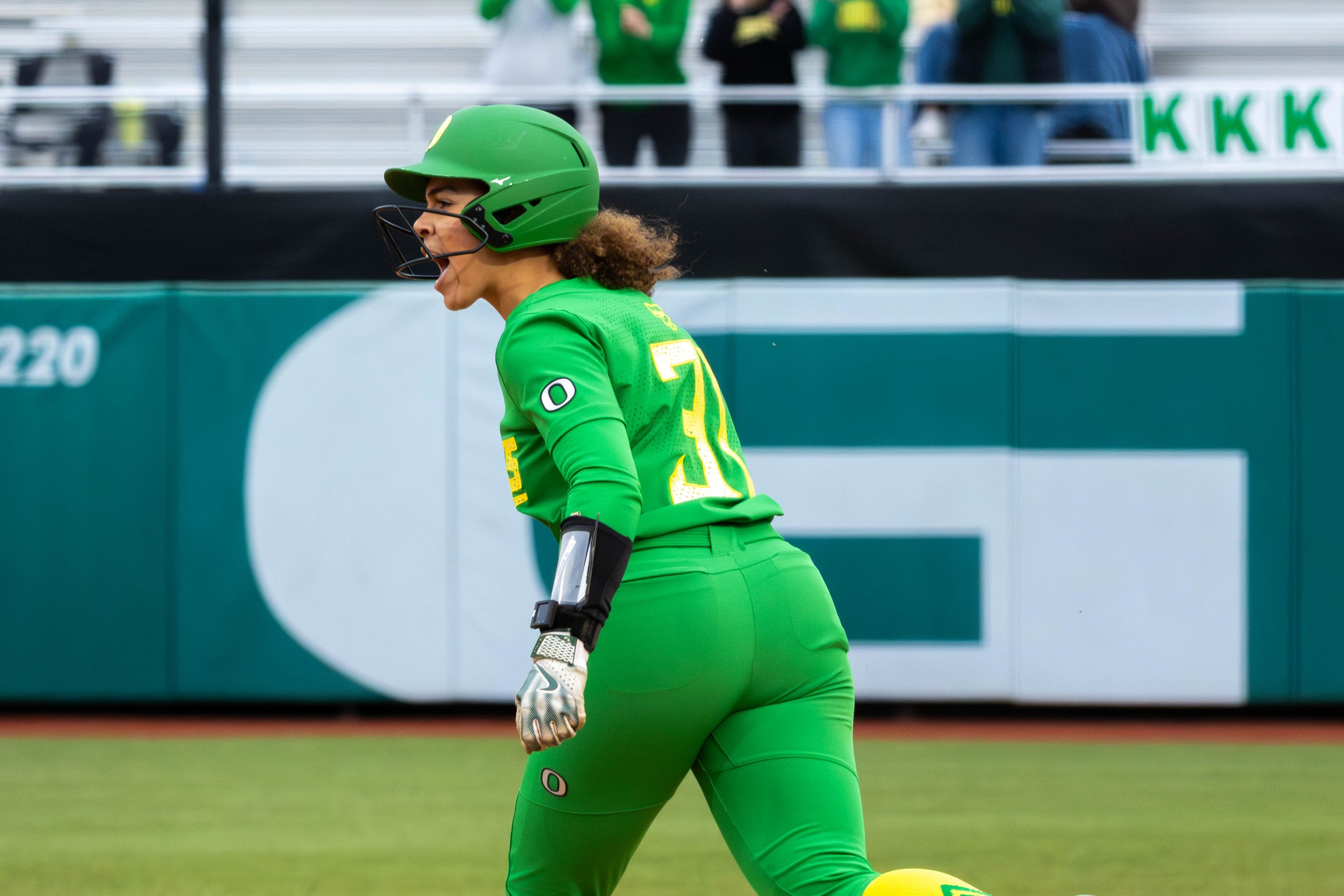 Amari Harper rounds first after homering at the Jane Sanders Classic