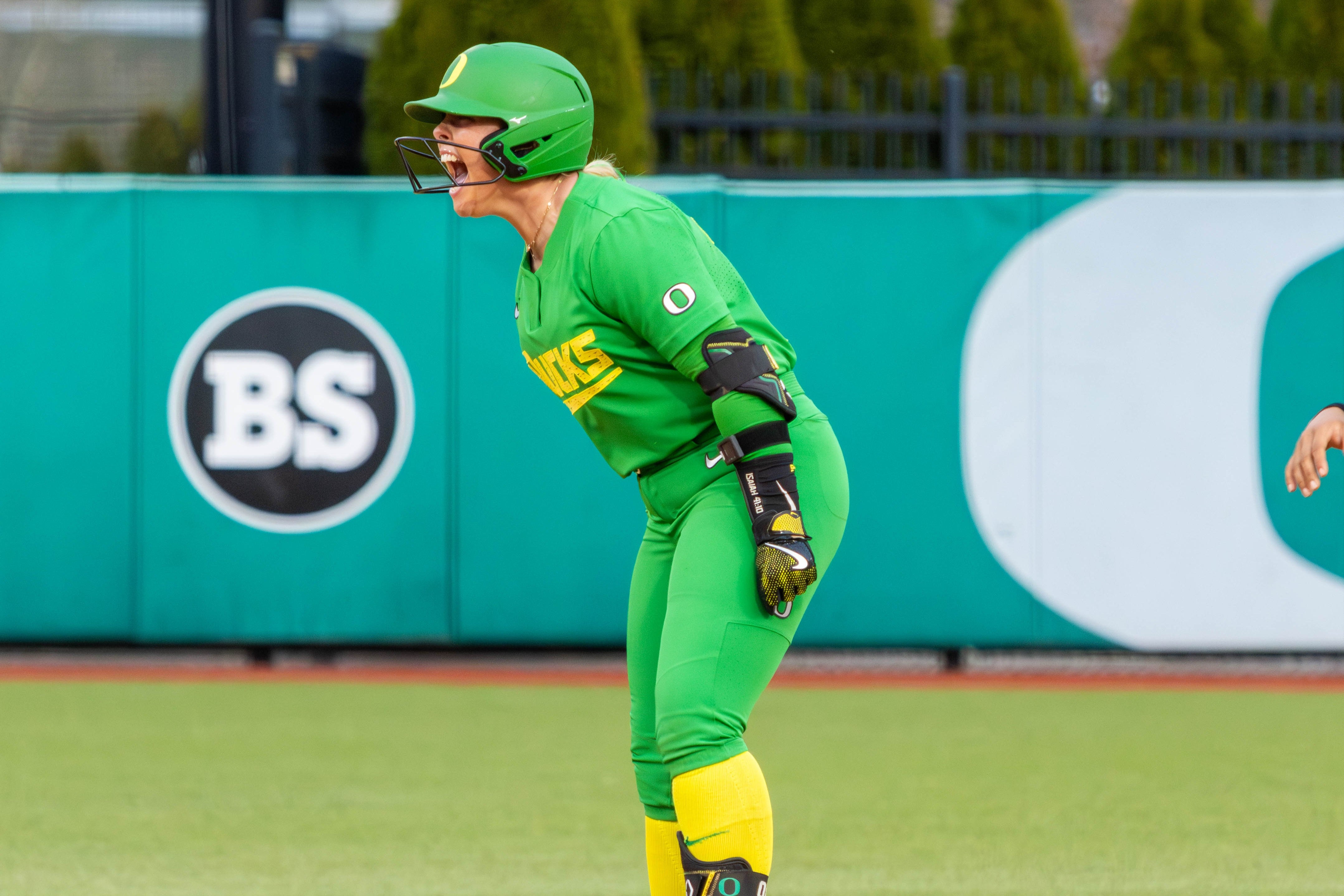 Rylee McCoy celebrates on second base after driving in a pair with a double