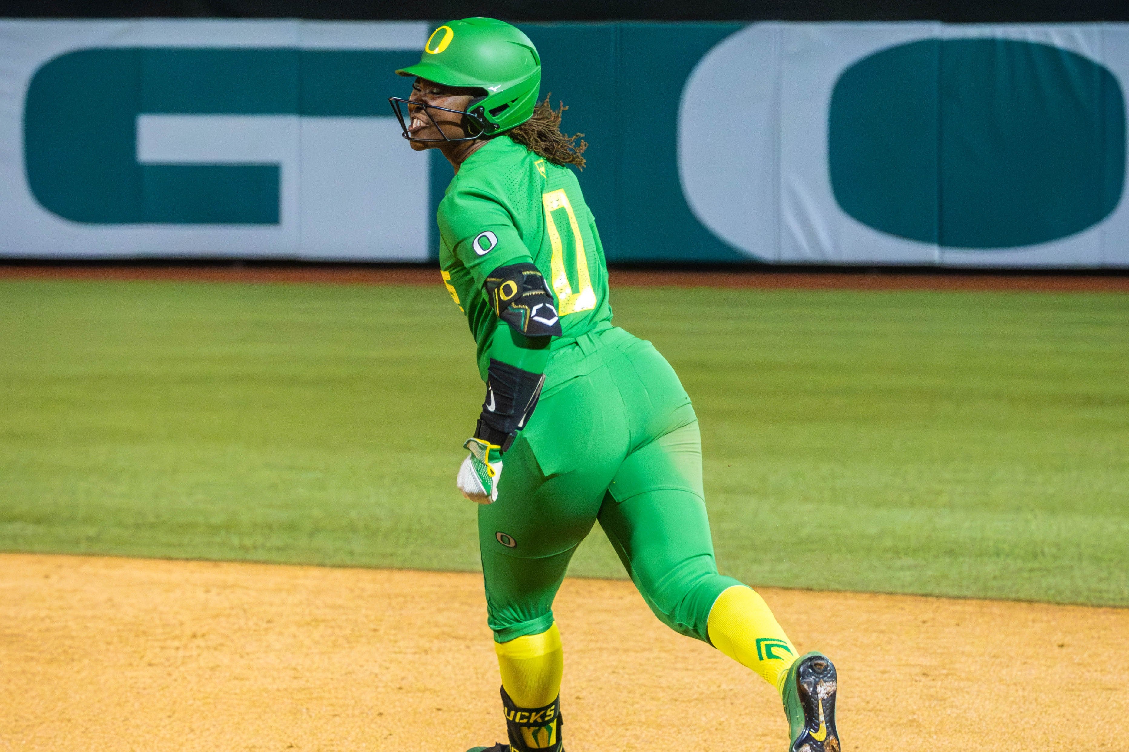 Elon Butler rounds first after homering in the fifth inning of Oregon's win over Sacramento State