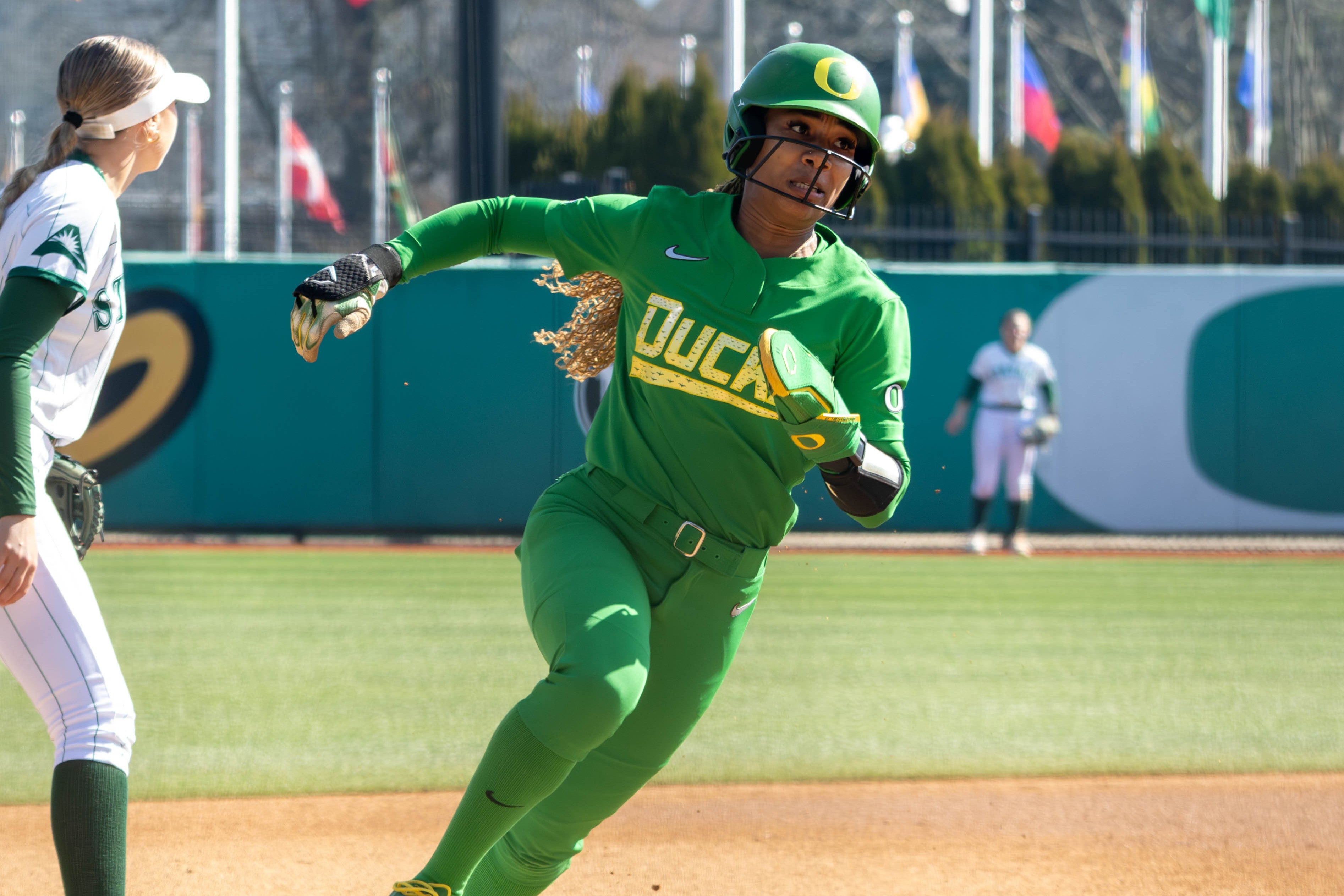 Oregon's Ayanna Shaw rounds third to race towards home