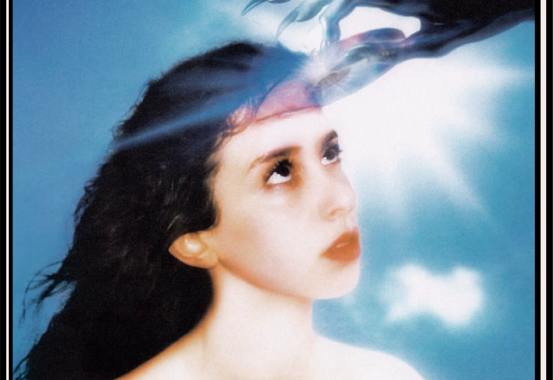 Magdalena Bay's Imaginal Disk album cover, which shows a CD being pulled out of their singer's forehead. Top text reads: TOP 30 CHARTS. Bottom text reads: SEP 3RD 2024