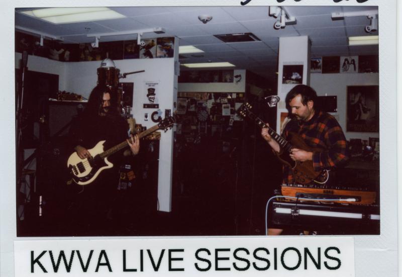 polaroid framed photo of the band "Weep Wave" performing live in the KWVA studios.