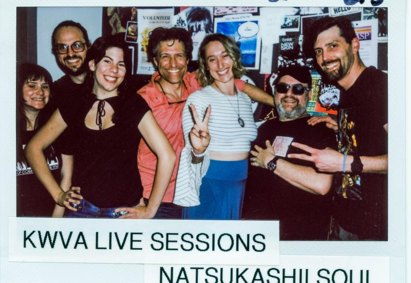 Polaroid framed picture featuring KWVA staff and members of the band Natsukashii Soul posing in the KWVA studios