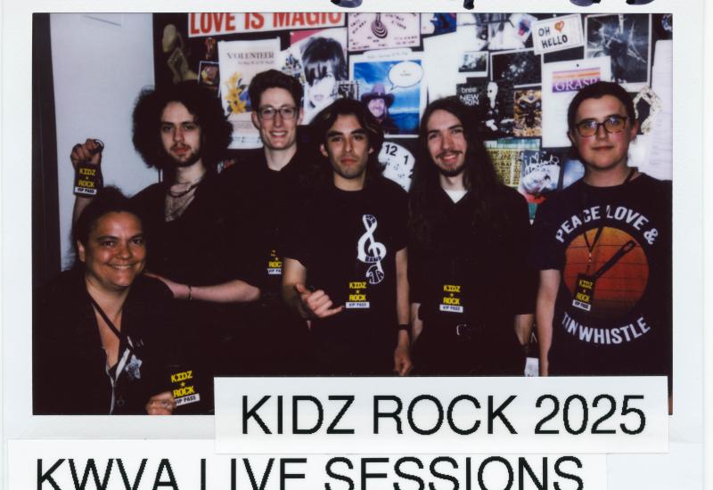 Polaroid photo of the band foxglove with ravi solomon and matrisha armitage posting in the kwva studios.